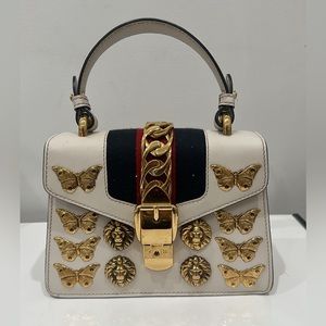 Gucci mini bag with Sylvie Leons & Butterfly decoration .